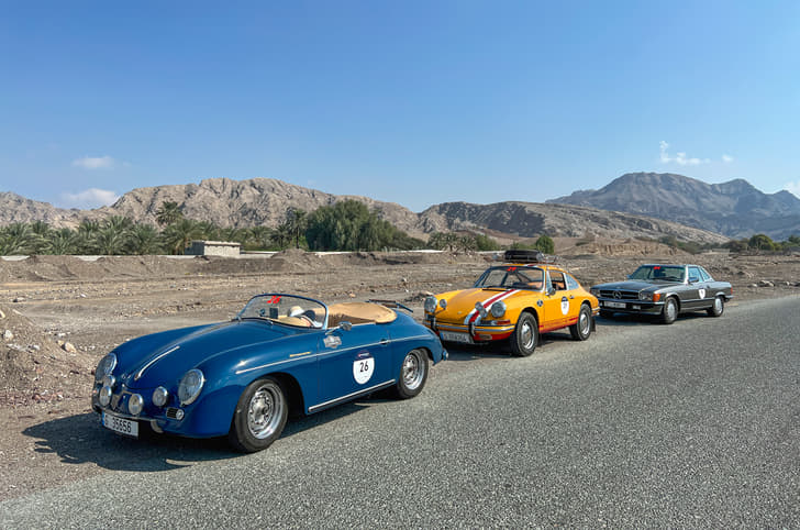 Porsche Speedster, Bahama Mama (Jacky Ickx’s Porsche 911), Perseus Bandrawalla and Chinmay Bafna's R107 SL in the desert in route to Ras Al Khaimah.